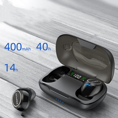 Wireless earbuds with charging case on a wooden surface, displaying battery information.
